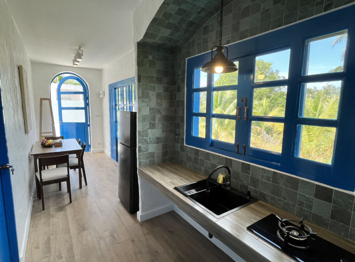 Penthouse kitchen with a view of the palms