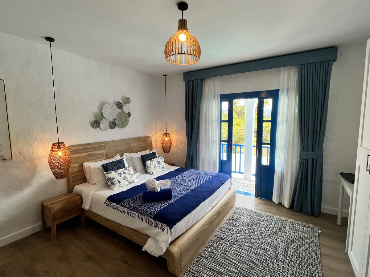 Penthouse bedroom with king-size bed